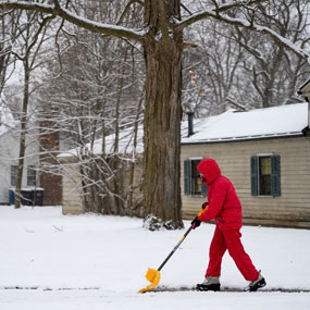 man shoveling snow