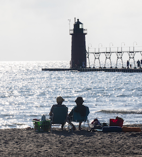 A couple enjoys Lake Michigan