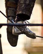 feet on tightrope