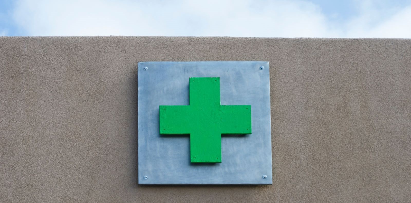 Image of a green health cross indicating a marijuana dispensary