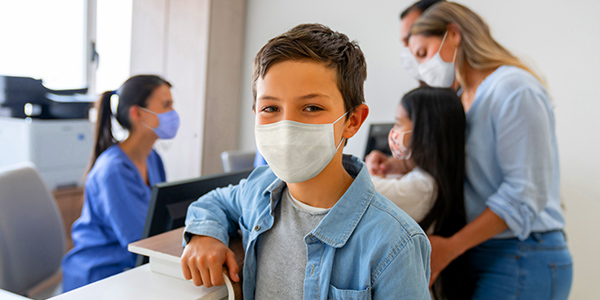 Mother with children at Urgent Care Center